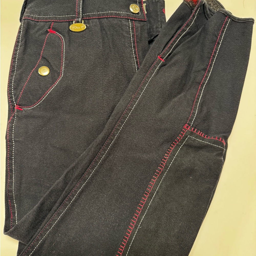 Navy full seat breeches with pink stitching
